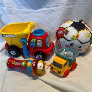 Vtech Drop Go Dump Truck- Fisher Price Musical Soccer Ball- Zoo Jamz Microphone
